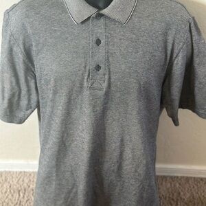 Men’s pre own as is Greg Norman collection golf polo shirt size M medium grey